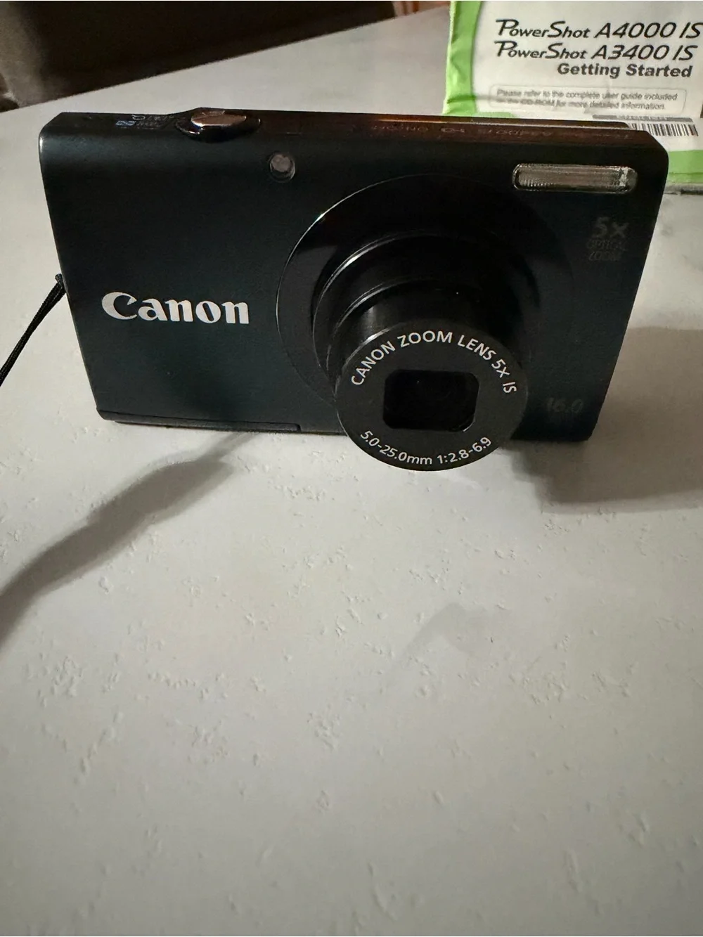 Canon power shot A3400IS Compact Digital Camera in Black with Red Carry Case